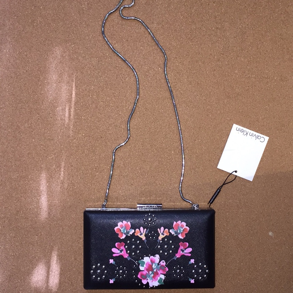 Calvin Klein clasped clutch with strap